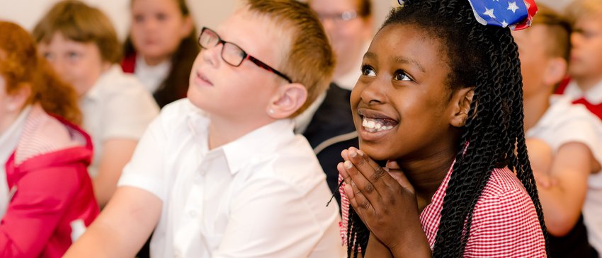 Children enjoying the Young Readers Programme