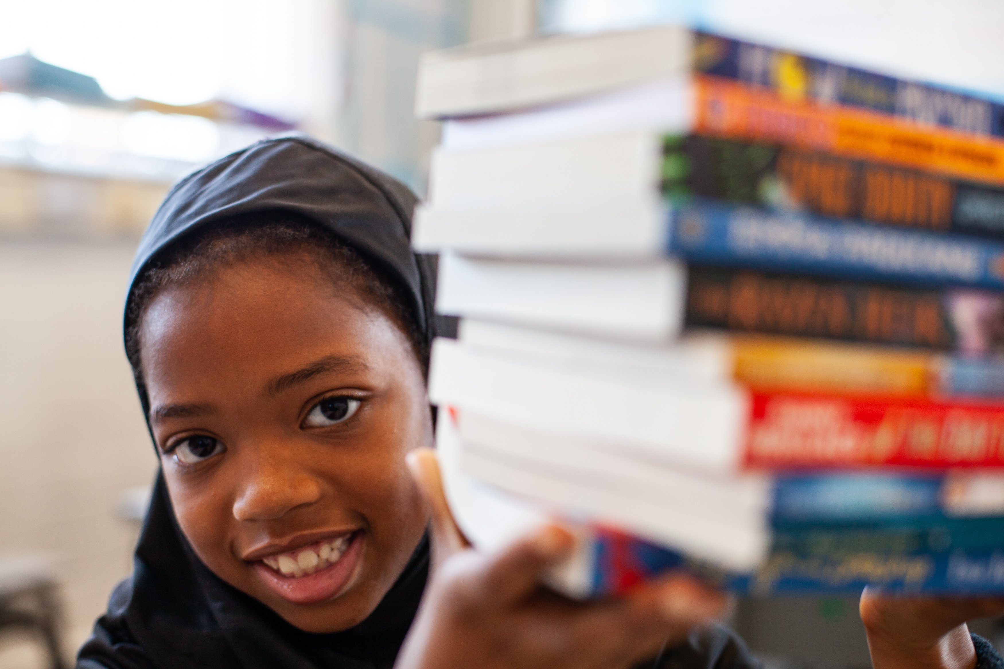 Afidat_Smiling With Books 1_Inglehurst Junior School 2022