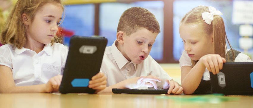 Boy and girl with technology tablet reading