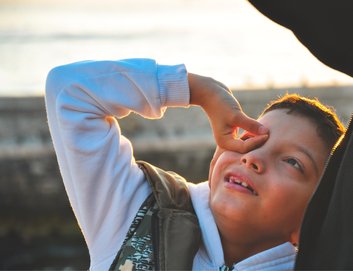 Child boy outside Community National Literacy Trust