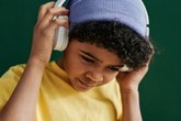 Child in hat and headphones