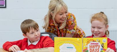 Children taking part in workshop with Emily Coxhead