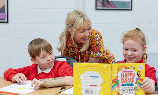 Children taking part in workshop with Emily Coxhead