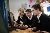 Secondary boys on computer