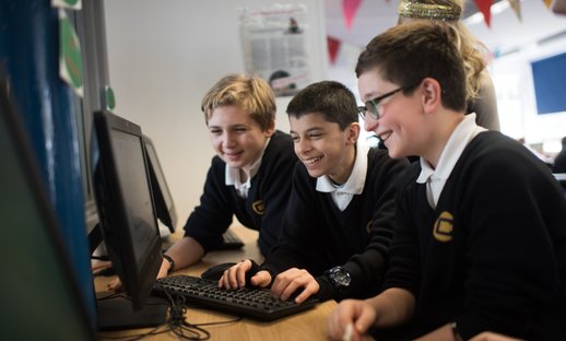 Secondary boys on computer