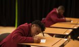 Secondary pupil taking exam