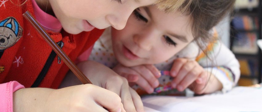 Wellbeing - girls writing