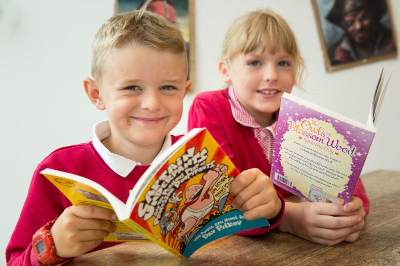 Primary school children reading