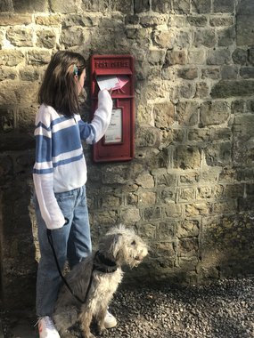 Girl posting letter