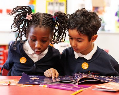 Image of children enjoying diverse books