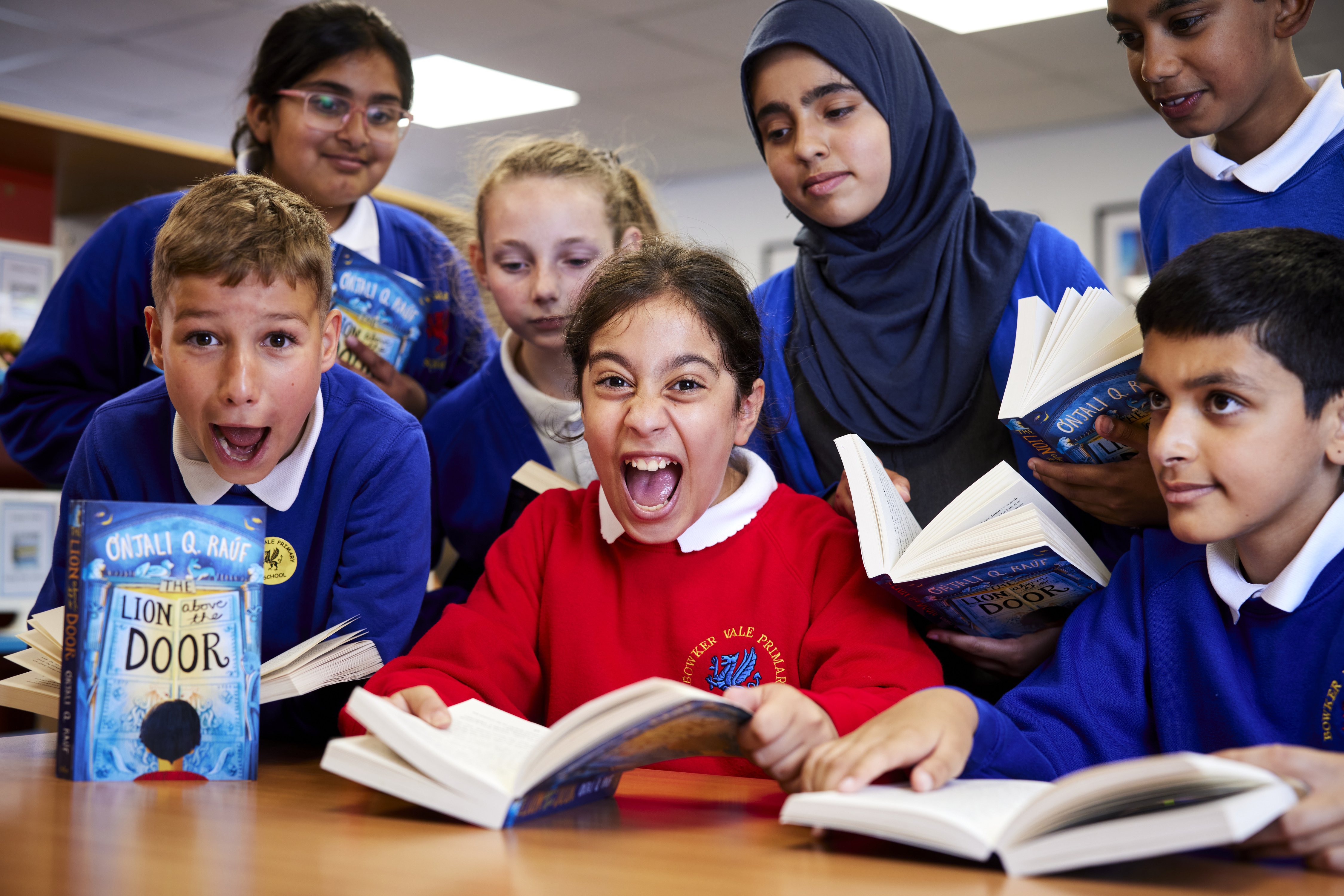 LION ABOVE THE DOOR children reading