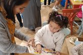 Mother and daughter sharing a book_Morrisons