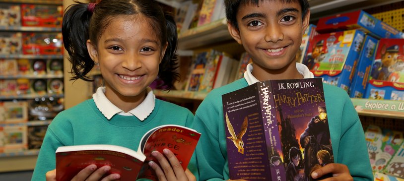 Pupils with their newly chosen books at Elk Mill Shopping Centre in Oldham.JPG