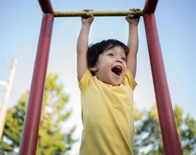 A child swinging in a park