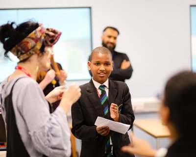 Teacher and pupil in classroom