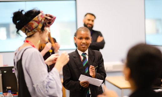 Teacher and pupil in classroom