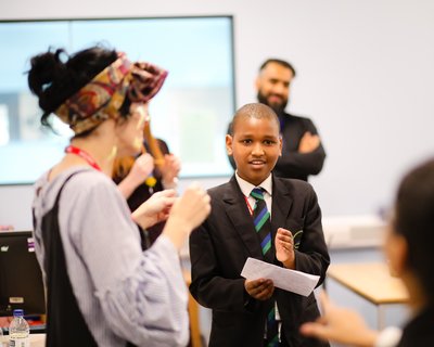 Teacher and pupil in classroom