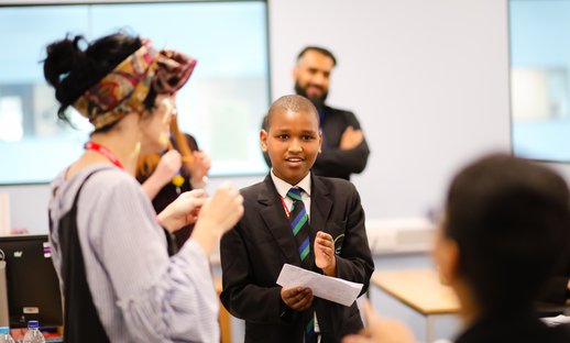 Teacher and pupil in classroom