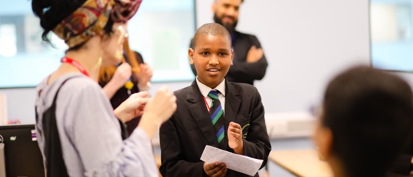Teacher and pupil in classroom