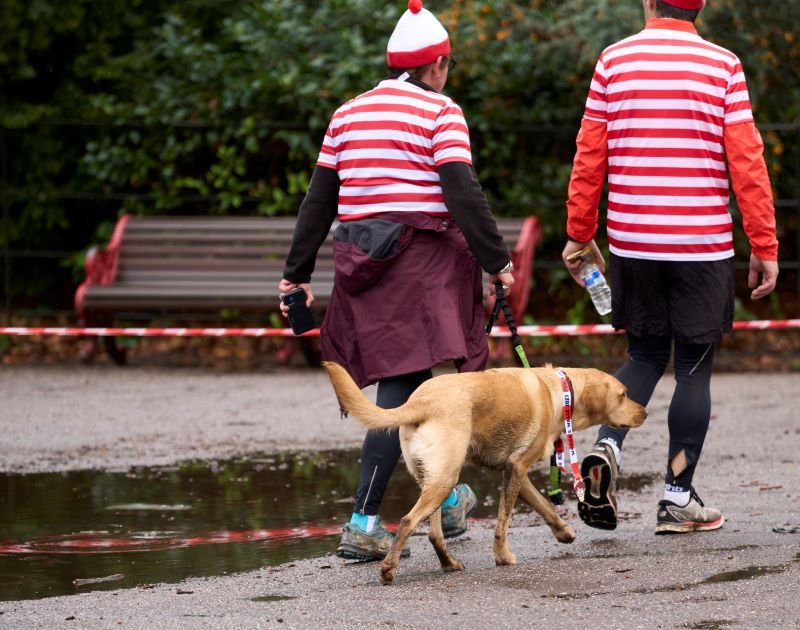 Couple take dog for a walk dressed as Where's Wally