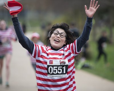 Woman runs in Where's Wally? 2023