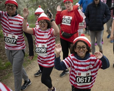 Where's Wally? Fun Run smiling faces at the start of the run