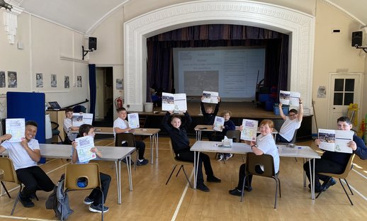 Spires jnr Students with workbooks.jpg
