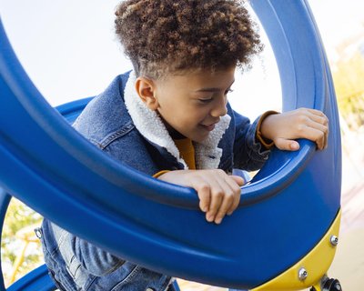 little-boy-having-fun-playground