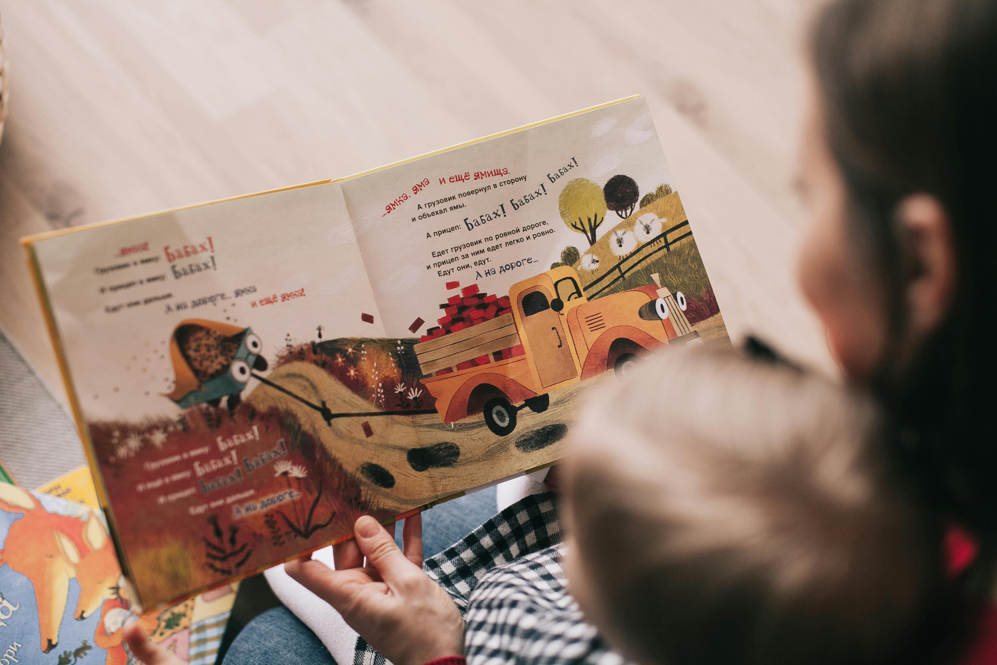 Stock photo - parent reading with child