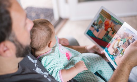 Dad reads picture book with baby_ free Unsplash downloaded photo