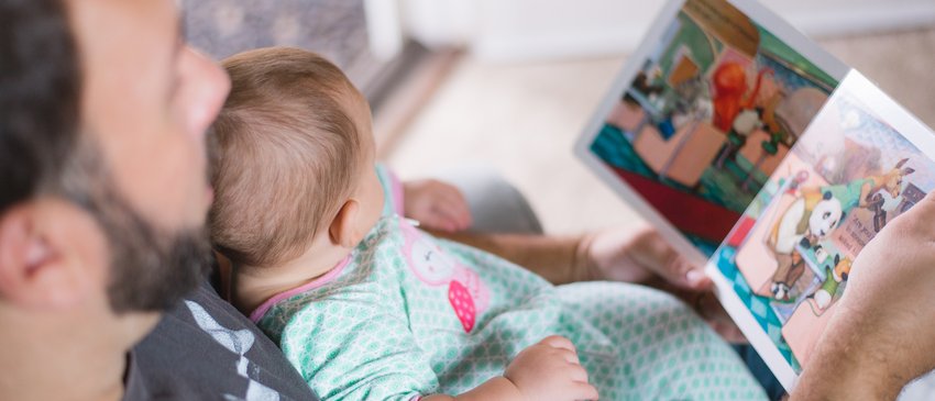 Dad reads picture book with baby_ free Unsplash downloaded photo