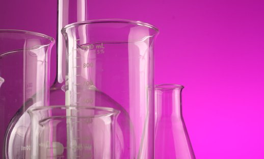 pink beakers stock image.jpeg