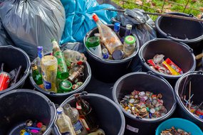 Buckets filled with different types of recycling